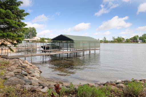 The covered boat slip measures 32x12 and includes the option to purchase a Chaparral 260SSiâpowered by a robust 8.1-liter, 400-horsepower engineâperfect for enjoying all that Lake Minnetonka has to offer.