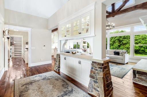 Hand-scraped walnut hardwood flooring - flows consistently throughout the entire home, excluding bathrooms & laundry/mudroom spaces