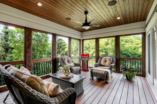 Spacious outdoor gathering area surrounded by screens and views for bug-free enjoyment. Brazilian Teak plank flooring and ceiling for exceptional beauty & durability.