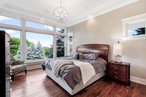 Located on the opposite side of the homeâs main level, away from the support and gathering areas for additional privacy. â¢	Windows along the entire back wall & a complementary corner window for panoramic views of the lush backyard.