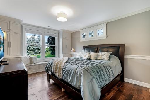 Bedroom 2: a mirror image of Bedroom 1 with the same amenities & perks + nearby Â¾ bath features granite counter, tile floors and shower with glass door and tile surround.