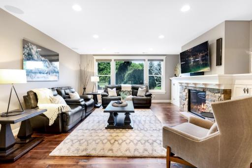 Oversized windows boast tranquil views of the backyard.