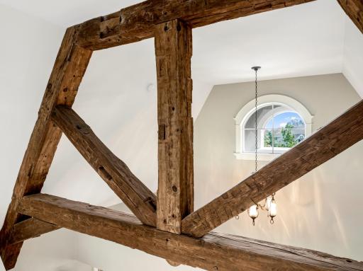 Reclaimed hand-hewn timber beams. Magnificent custom work in all areas of the home.