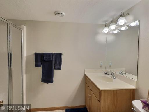 Ideally situated just down the hall from two additional bedrooms, the 3-quarter serves as the perfect guest or family bathroom.
