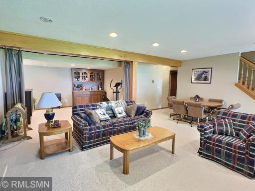 The spacious lower level offers a flexible layout perfect for entertaining, relaxing, or hosting guests...featuring an open concept.