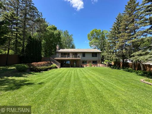 The home offers both a covered patio and a large upper-level deckâperfect for entertaining.