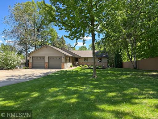 Stunning lush grass, mature gardens and beautiful shade trees complete the park-like setting.