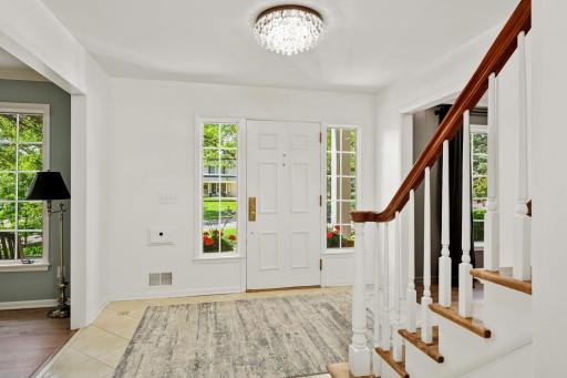 A extra thick front door with sidelight windows
