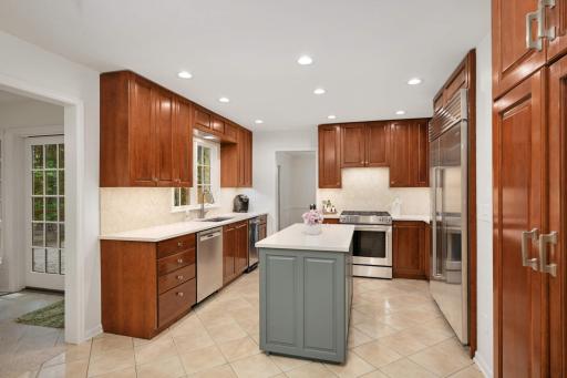 Beautiful Cherry cabinets and recessed lighting