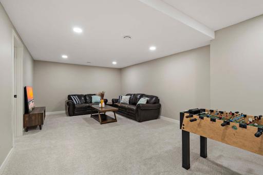 The basement level has an expansive rec room.
