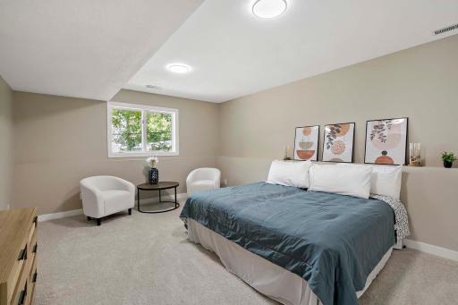 The huge lower-level bedroom would be perfect for multi-generational living; it could serve as a second primary bedroom.
