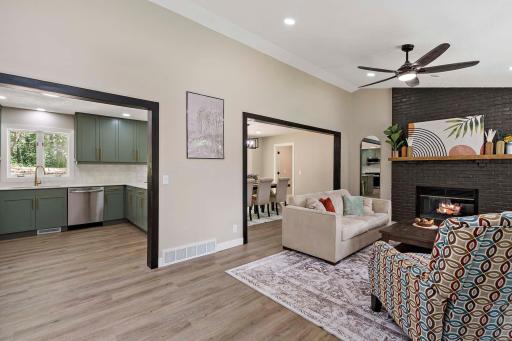 You open your front door into your great room with vaulted ceilings