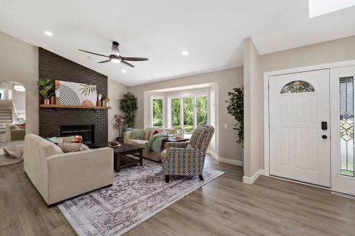 Before you enter the kitchen, you turn around and admire the bay windows and warm fireplace.