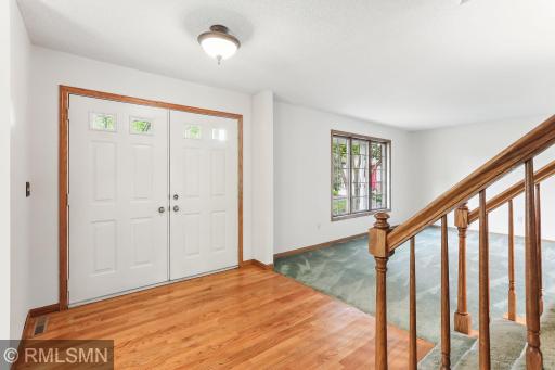 Welcome guests in this home's spacious entryway