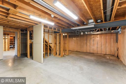 Unfinished lower level is ready-made with framing in place to add 1,130 sq ft of finished living, including 5th bedroom, 4th bathroom, and bonus room