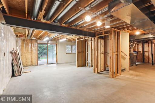 Unfinished lower level is ready-made with framing in place to add 1,130 sq ft of finished living, including 5th bedroom, 4th bathroom, and bonus room