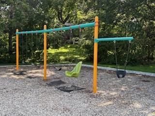 Corner Park Playground swing set for all ages.