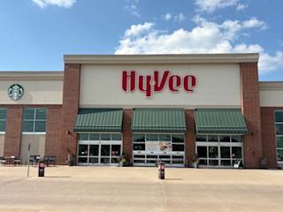 Humongous HyVee grocery store and Starbucks close by.