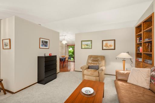 The living room flows into the dining room.