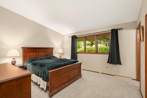 The extra spacious primary bedroom includes a private 3/4 bathroom.