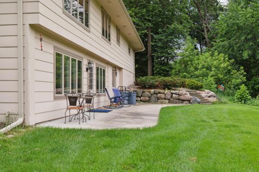 Enjoy nature from the patio out back that overlooks the vast and green back yard.