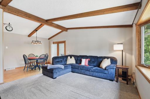 Welcome Home! Beautiful vaulted ceilings with wood beams provide extra spaciousness!