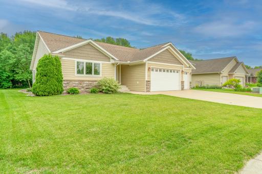 Well-maintained exterior with a clean, manicured lawn