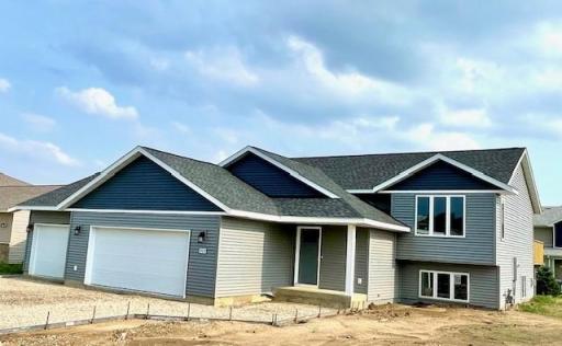 Front of property, concrete and lawn/landscaping to be completed