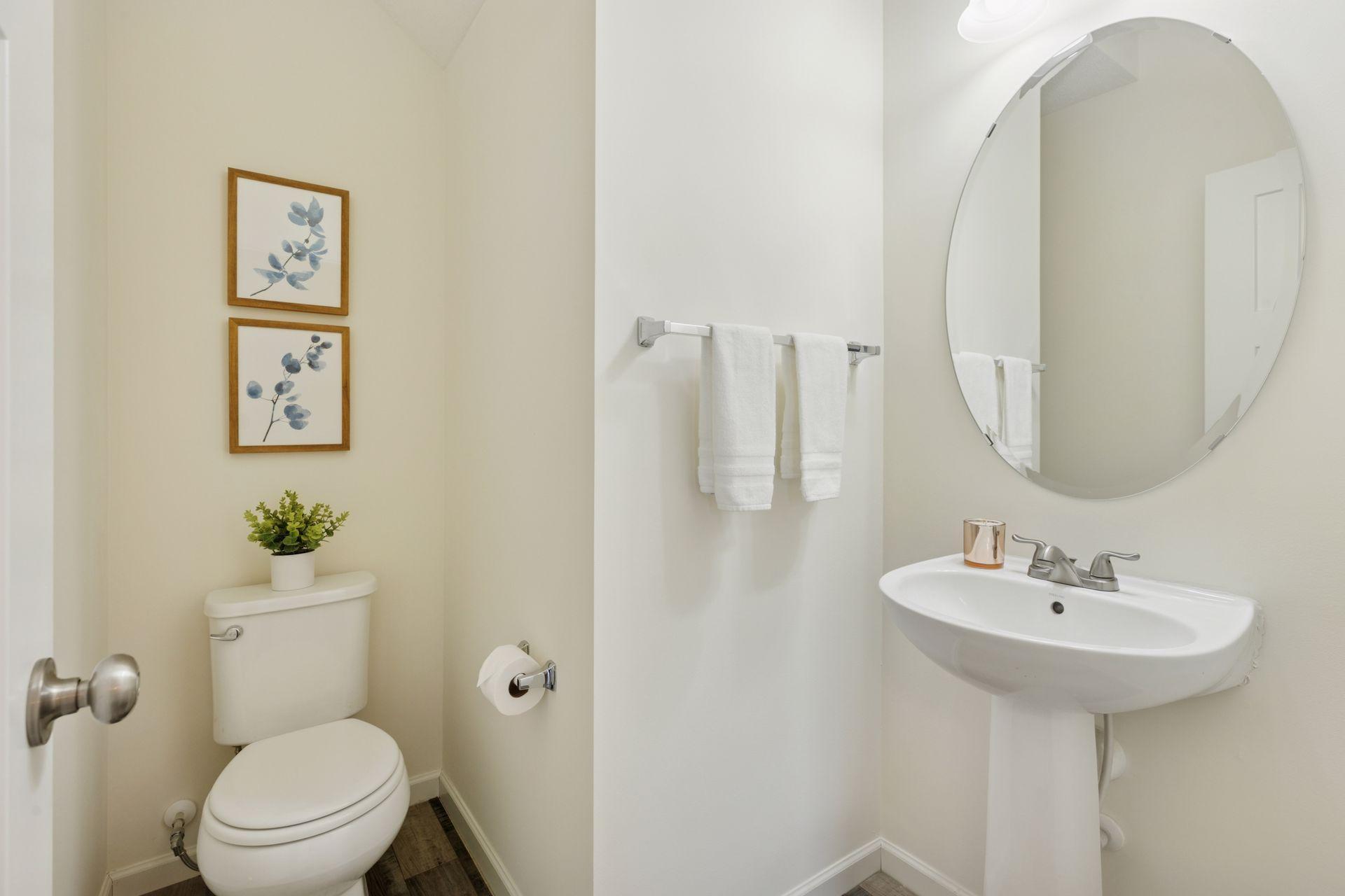 Oh, and let's not forget the all important powder room on the main level for all your guests.