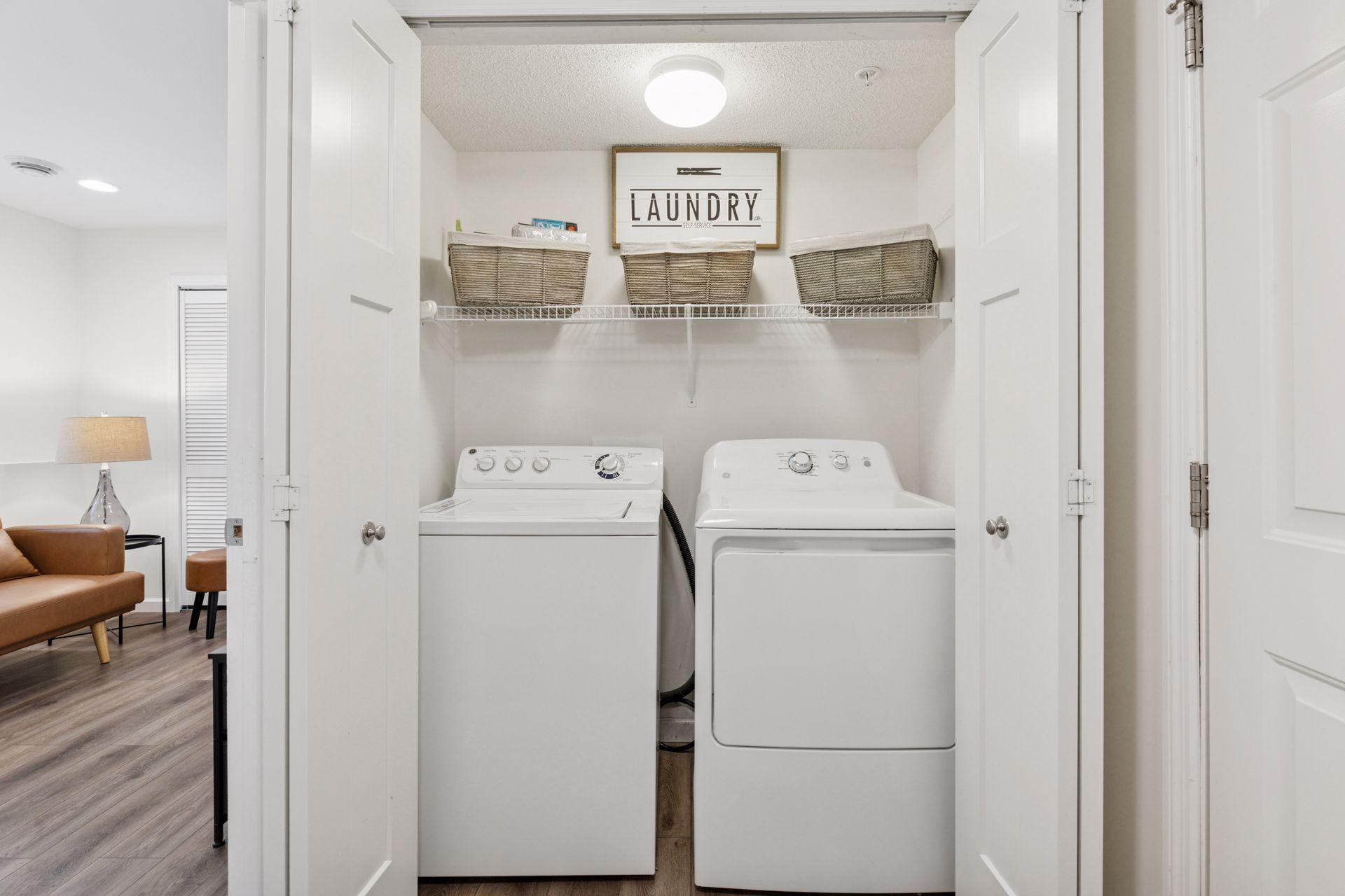 Full size washer and dryer closet on lower level.