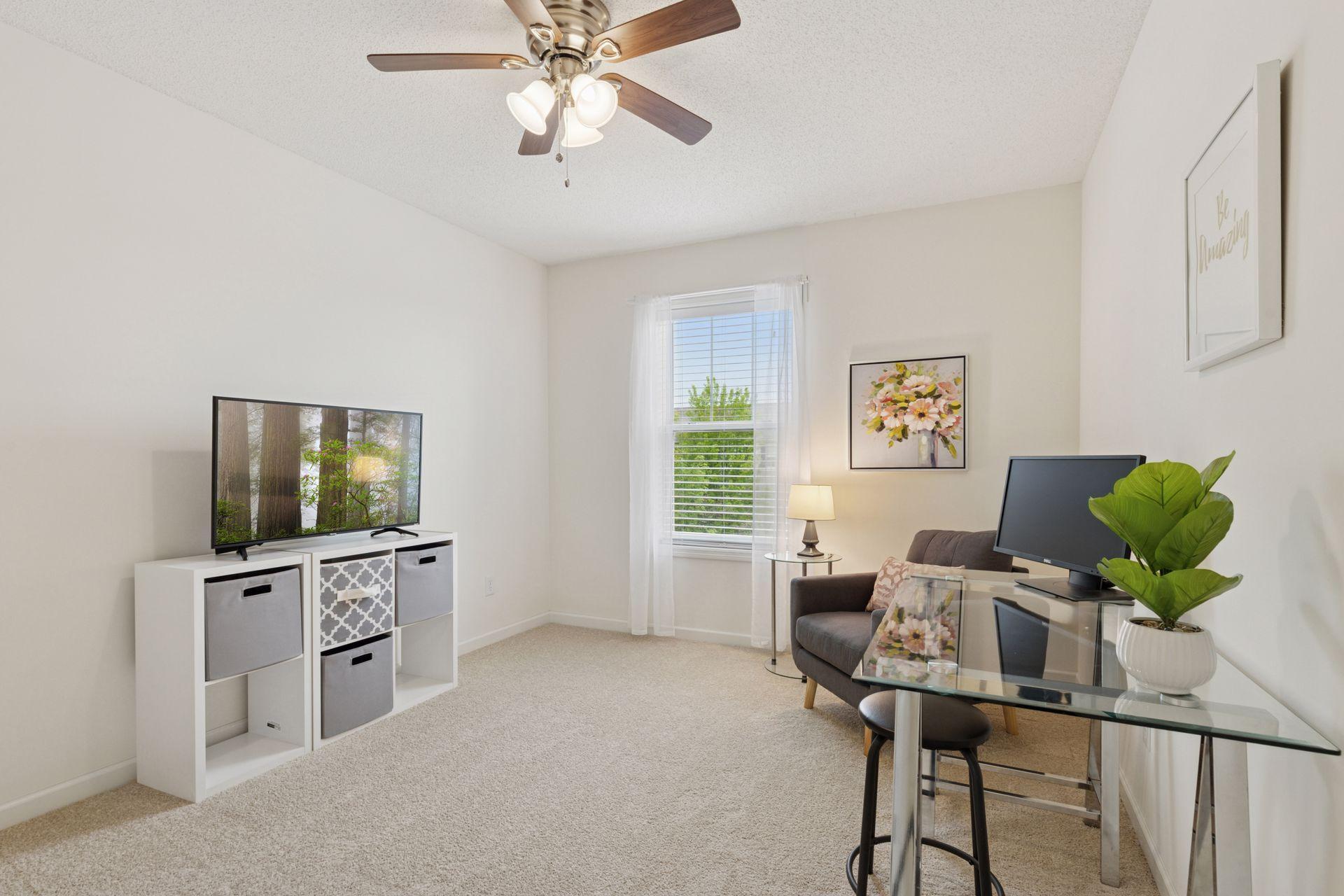 Upper level 3rd bedroom also features fresh paint and new carpet. Currently being used as a den.