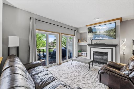 Tons of natural light flows in through the large living room windows