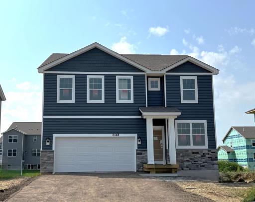 Welcome to the Holcombe! *Photo is of the actual home for sale!