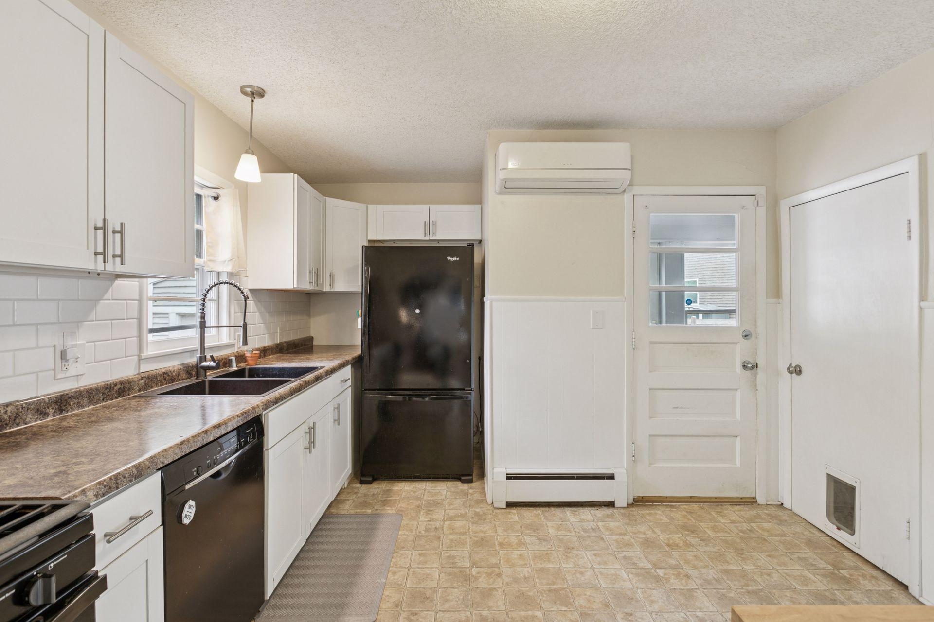 Classic white woodwork and cabinetry.