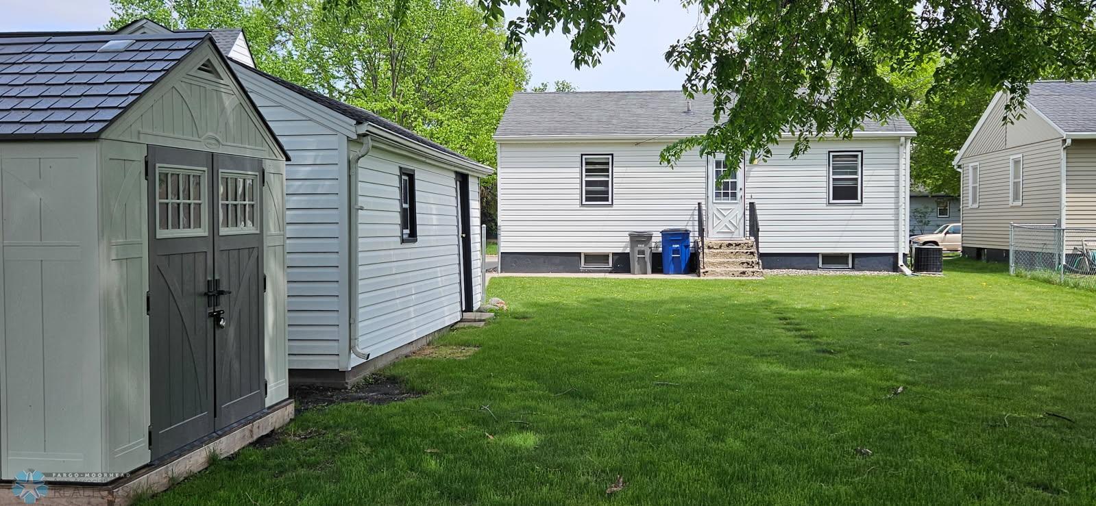rear view of house and yard