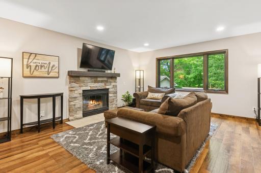 Main-Level Fireplace â Gas fireplace provides warmth and style all year long.