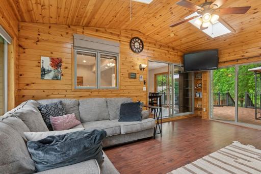 Coffee, Please! â Four-season porch offers scenic views and daily comfort.