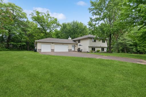 Welcome Home! Located at the end of a peaceful cul-de-sac with a long private driveway.