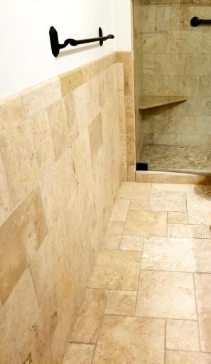 Heated travertine floor.