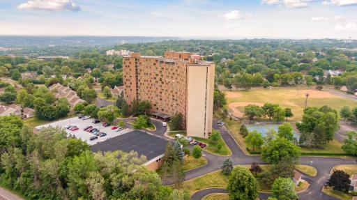 Free outdoor overnight parking for you or your guests in lot or next to the building on both sides of the building. Moving in parking spots in the back of the building near the garage door.