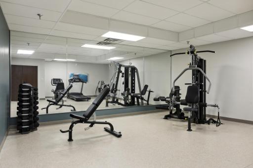 New gym equipment and fitness bathrooms with showers.