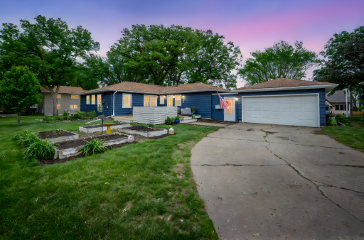 1312 Beach Pl Fairmont MN-01 day to dusk.jpeg