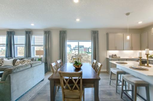 Informal dining room off the back of the home! *Photos of a similar home. Colors and options may vary.