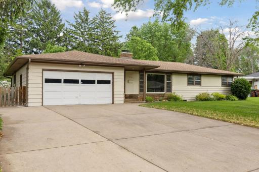 Extra wide driveway for two extra cars on left side. And still be able to get in and out of the garage.