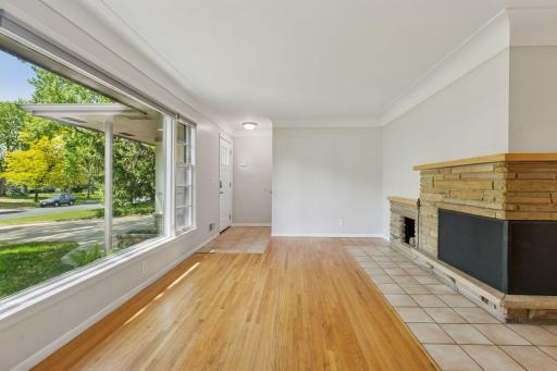 Living room with Hardwood floors and lots of light.