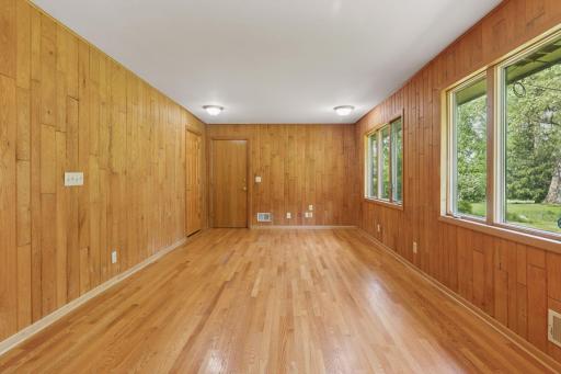 Main floor family room with door to garage and outside