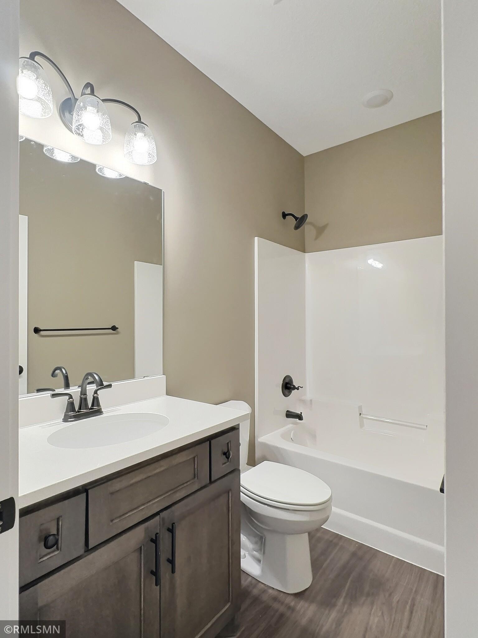 A full bath centers the 2 bedrooms but still located near the the living room.