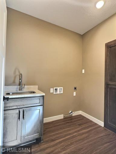 The laundry room is conveniently located outside the primary bedroom for ease of use.