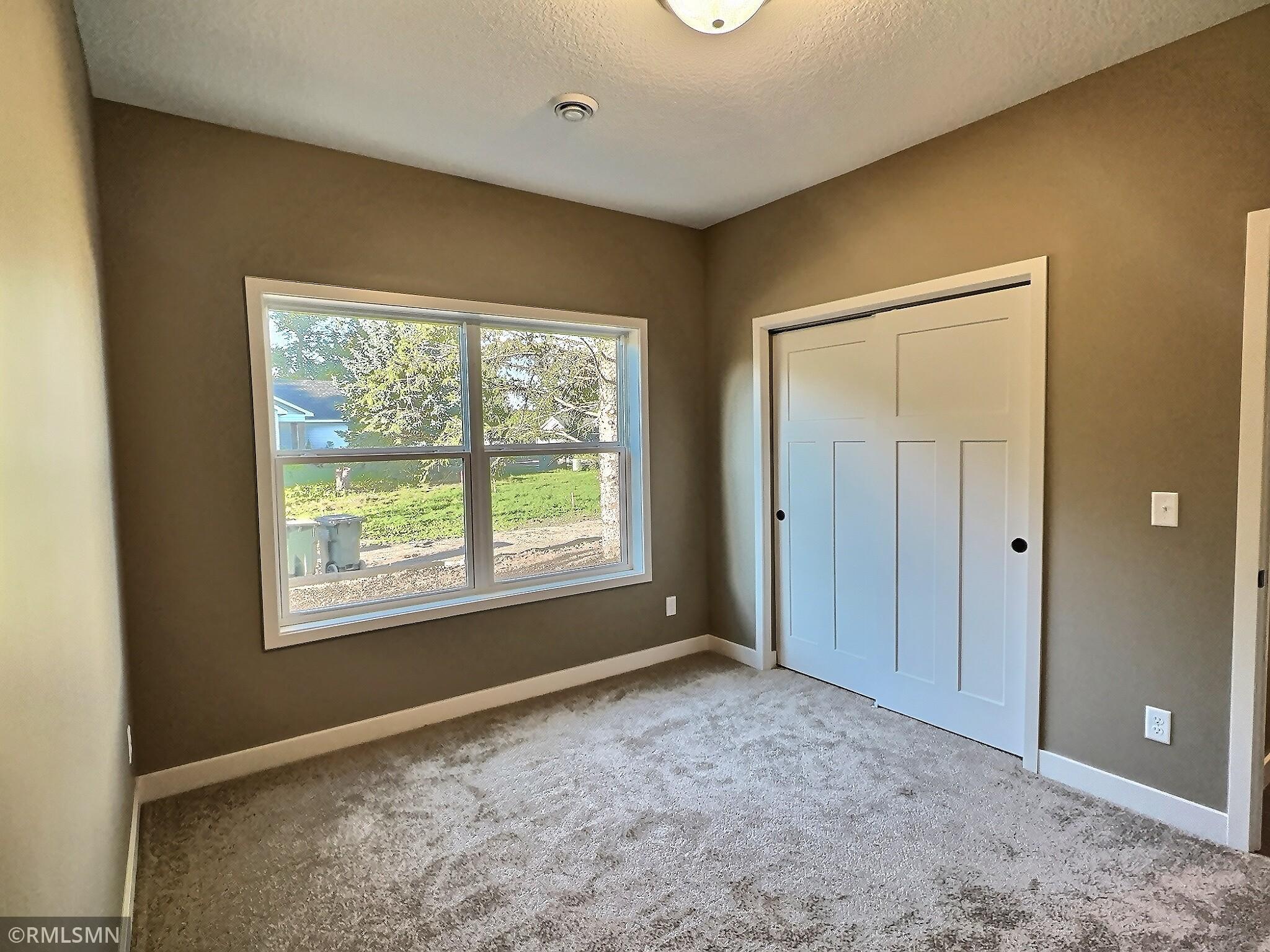 Here is the 2nd bedroom of the home. Perfect for overnight guests or family to stay when visiting.