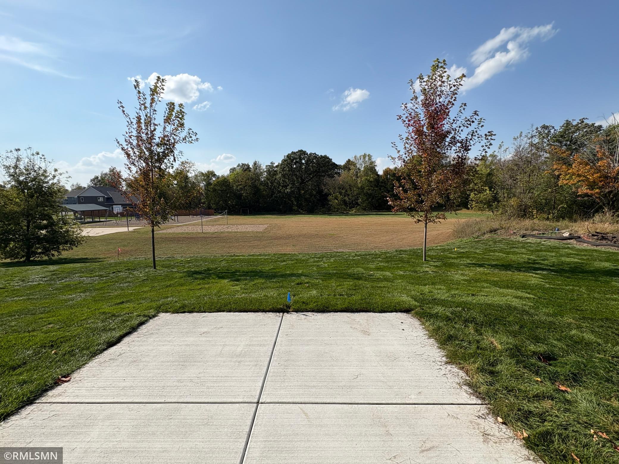 Open patio off the dining room ideal for outdoor entertaining. Great view overlooking the community park and green space.
